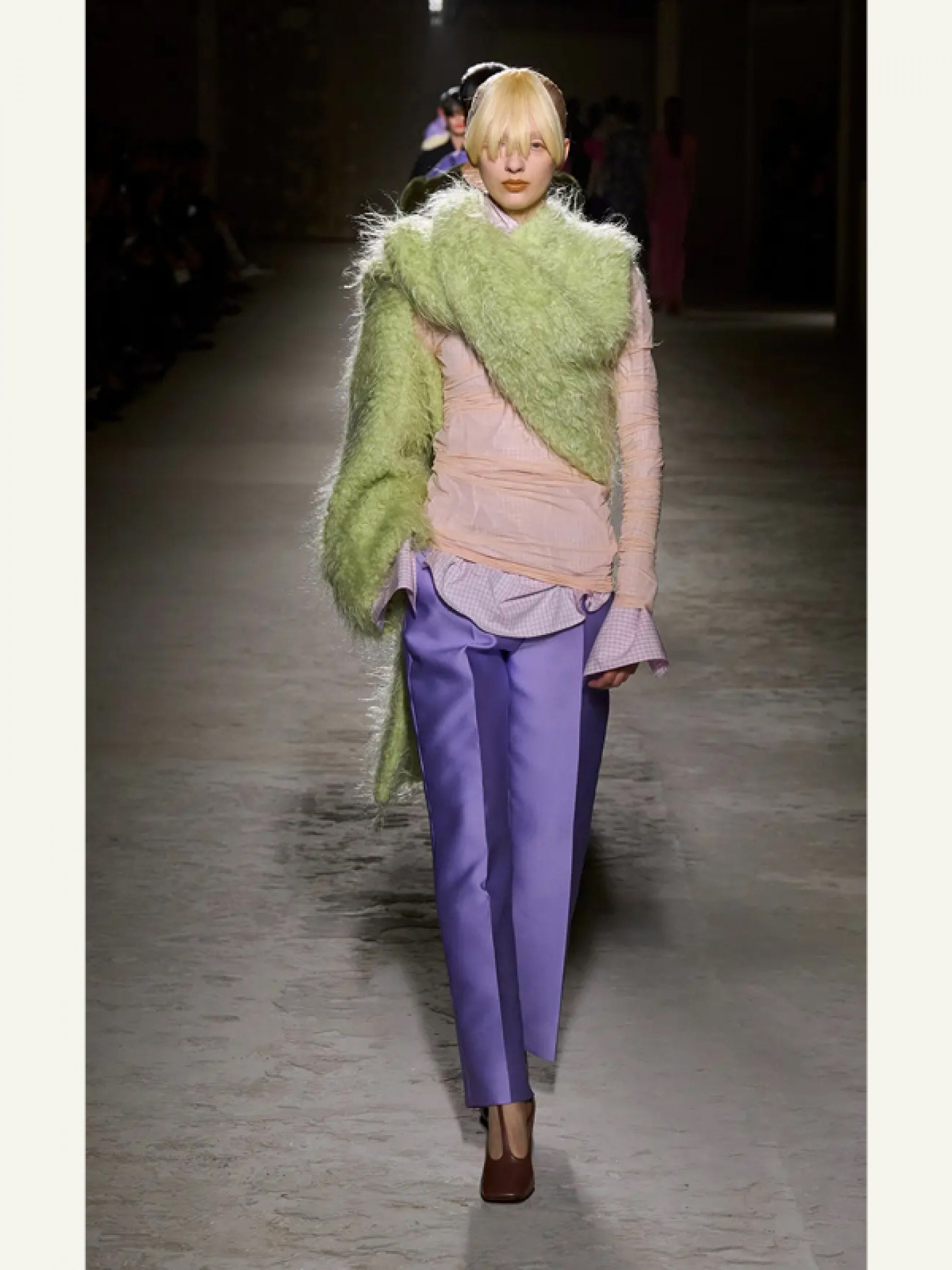 Model wearing purple pants, pink top and green shawl