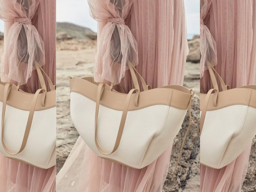 model holding bag lifestyle picture