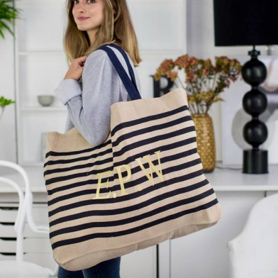 lady modelling a beach bag