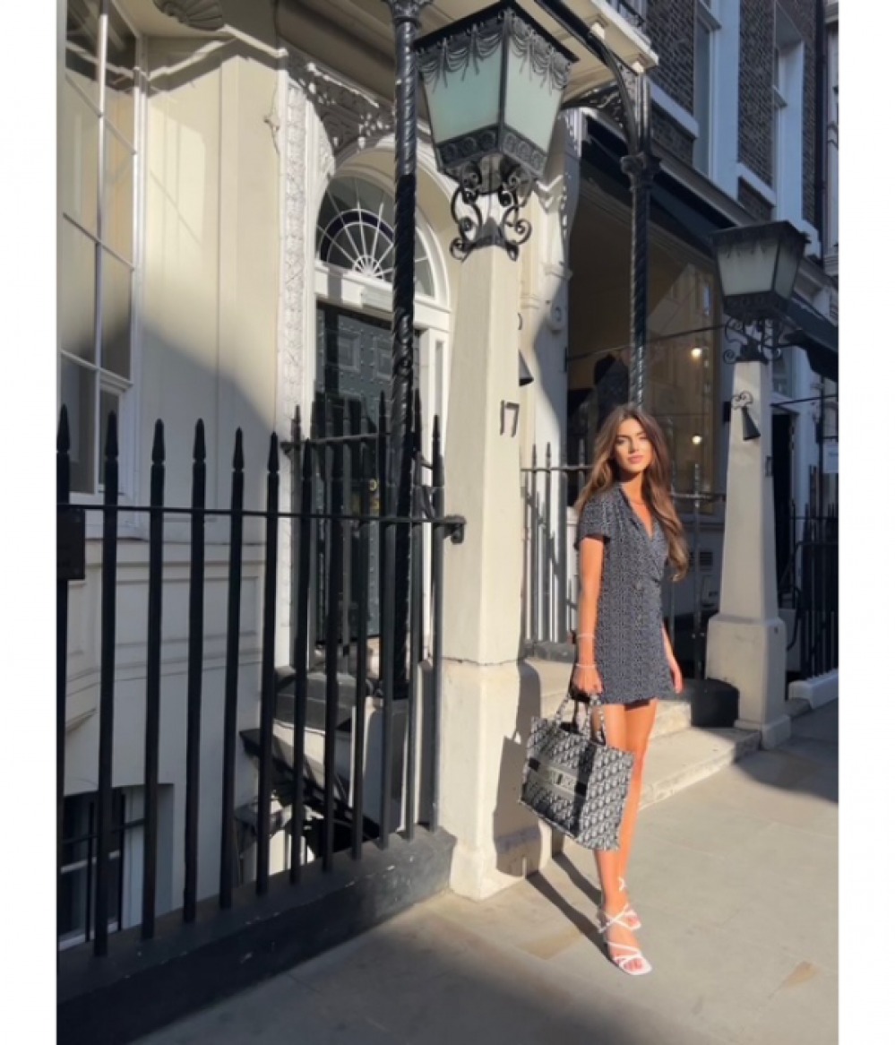 Hannah Clemit in front of a doorway