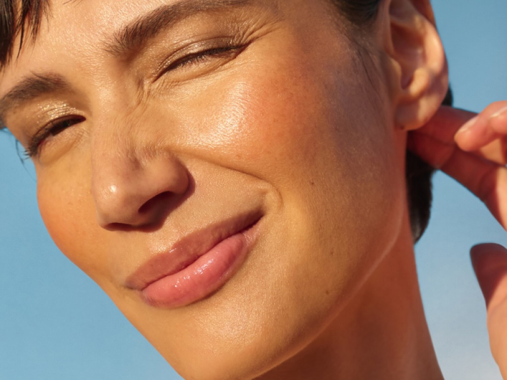 Golden glow makeup on middle aged model