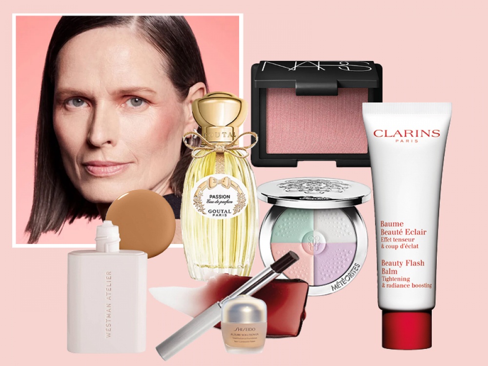 beauty products cut out on pink background