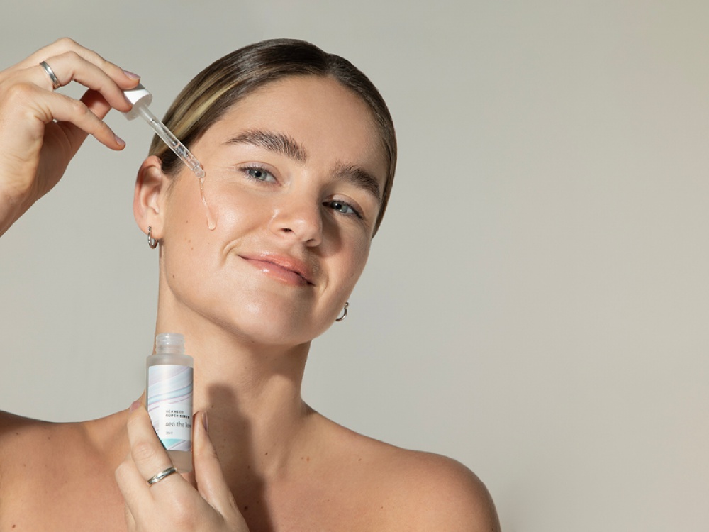 Model using Sea the Love face serum