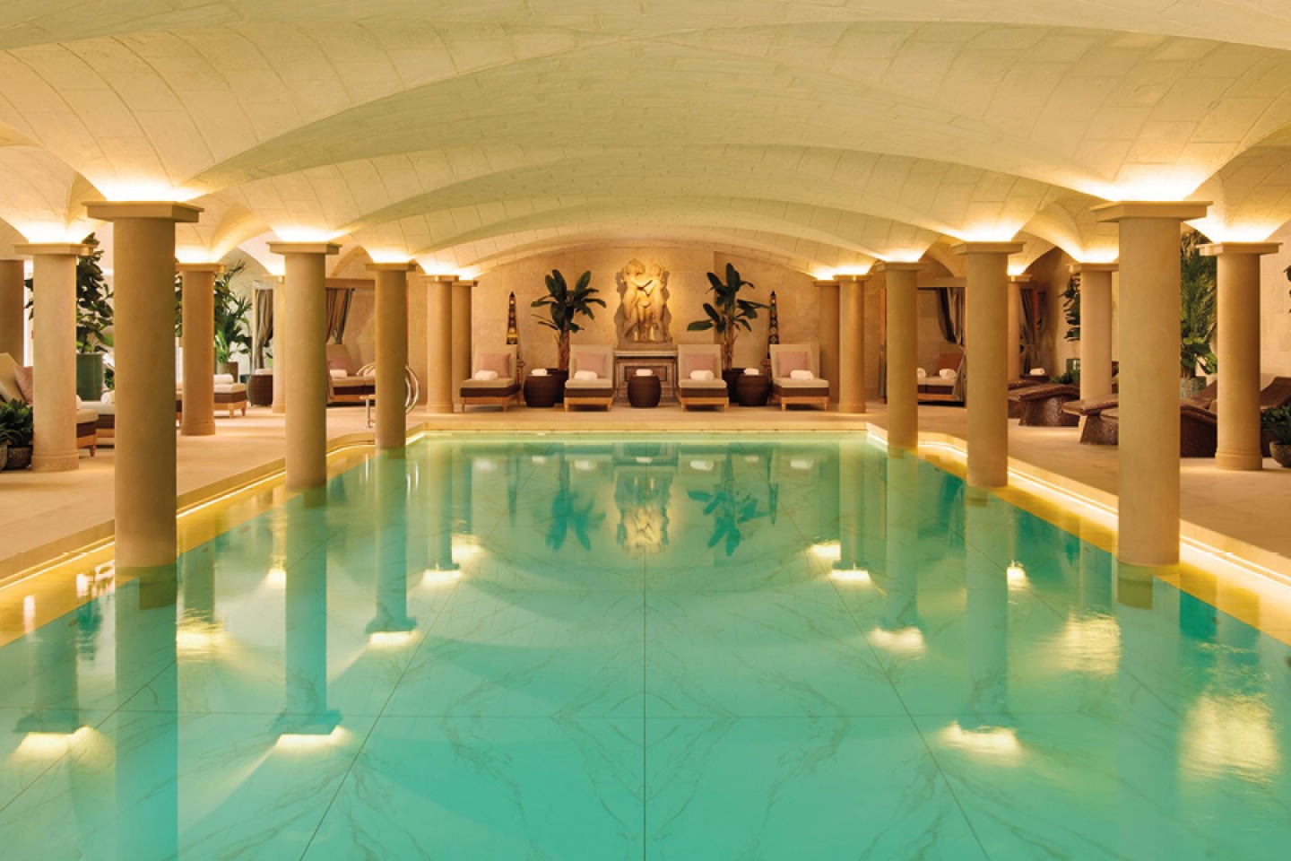 Indoor swimming pool with loungers