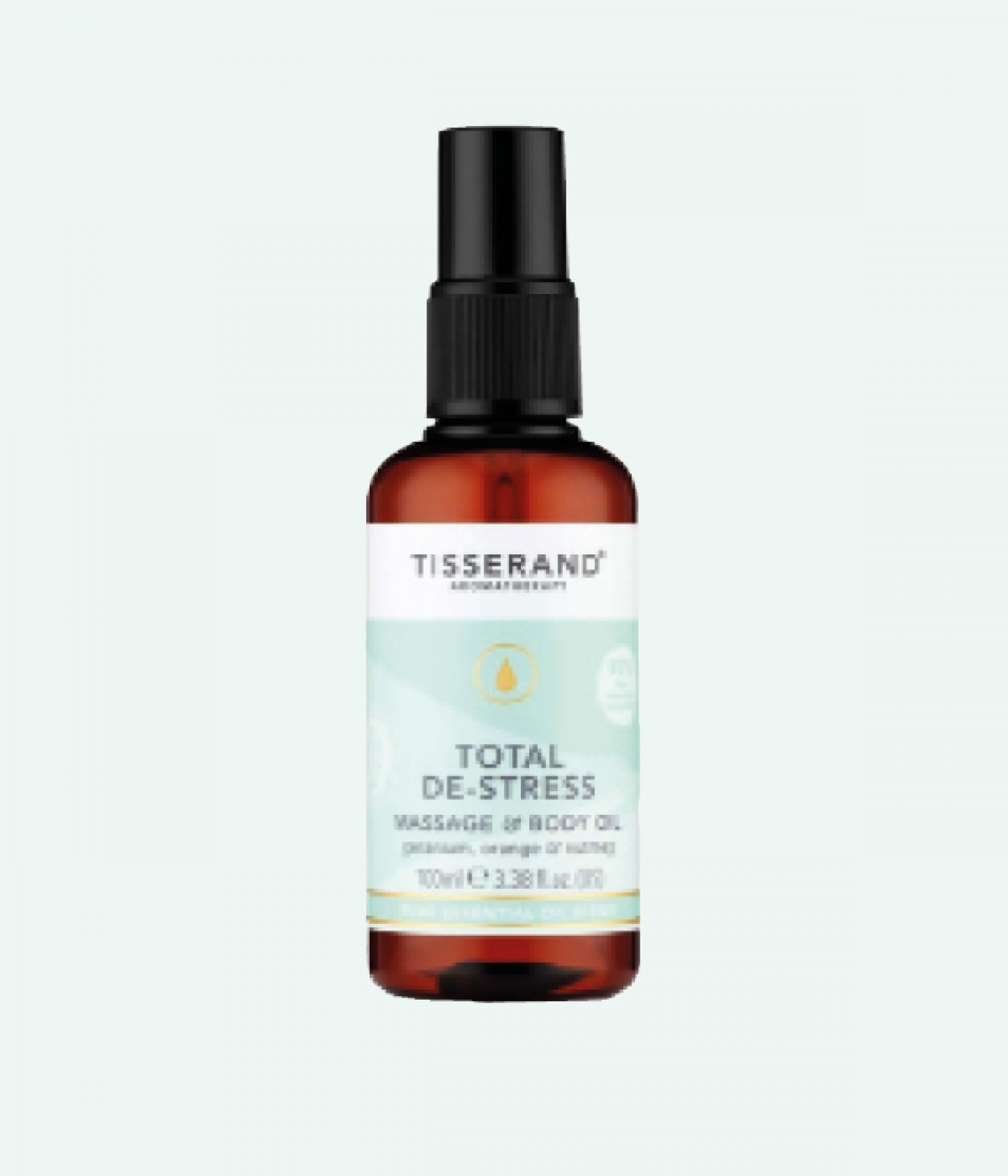 bottle of de-stress body oil on mint coloured background