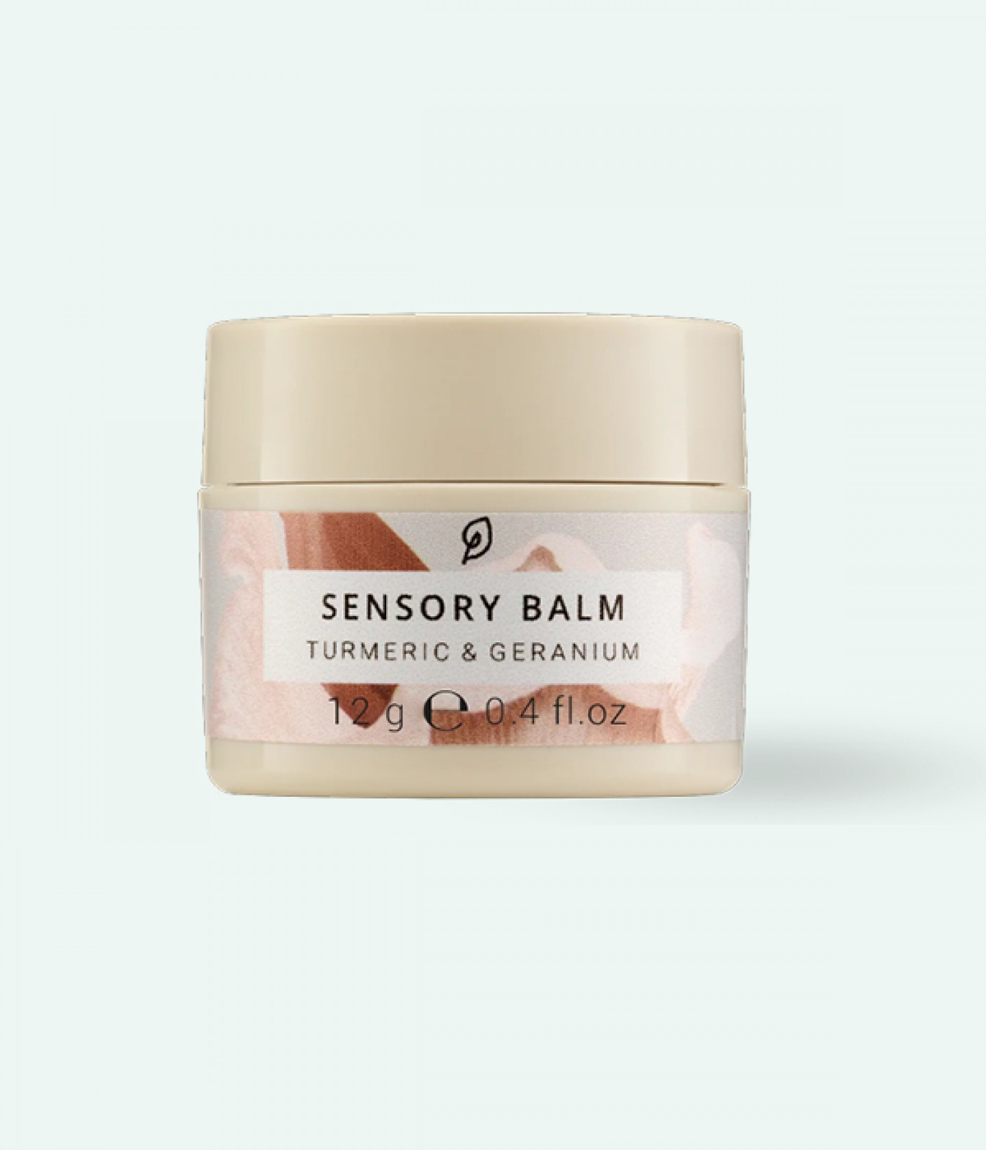 tub of sensory balm on a mint coloured background