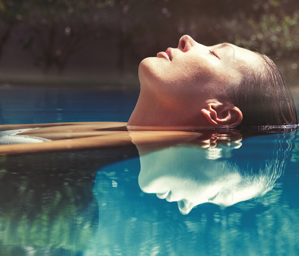 woman bathing in water