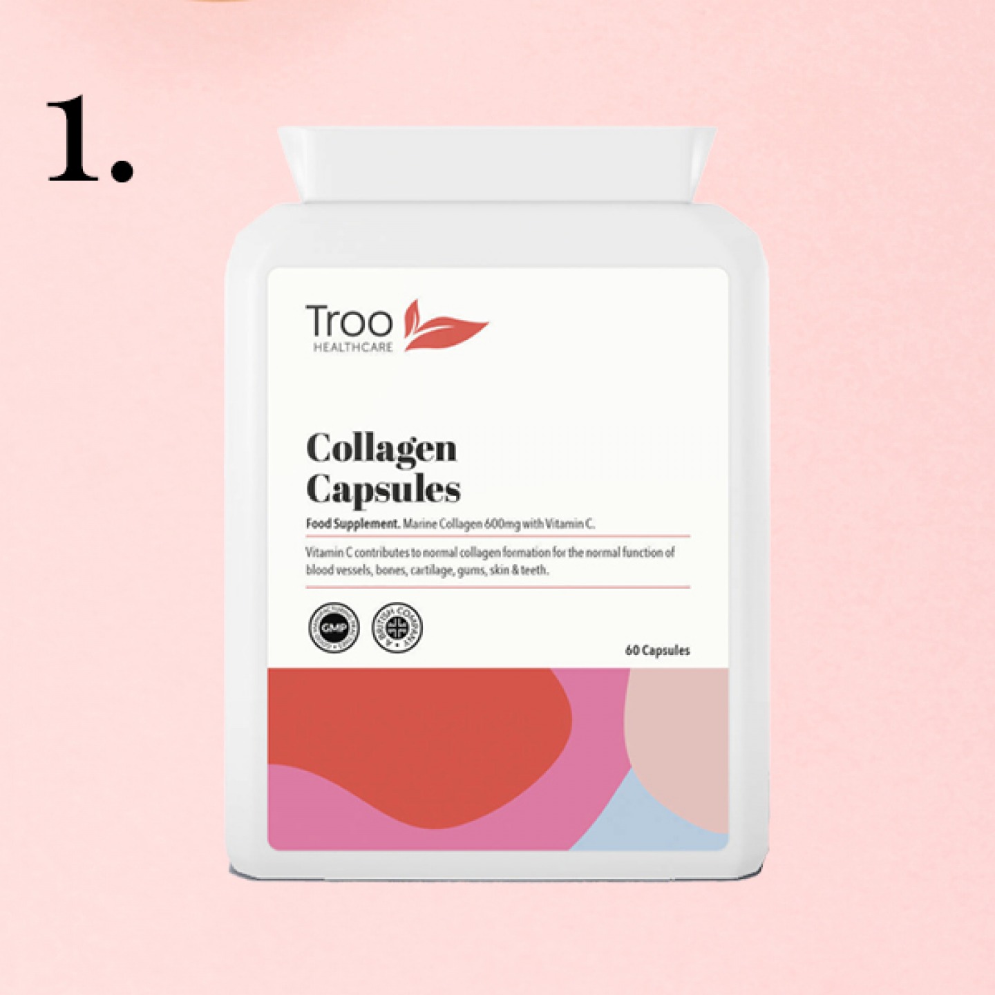 collagen capsules bottle on pink background