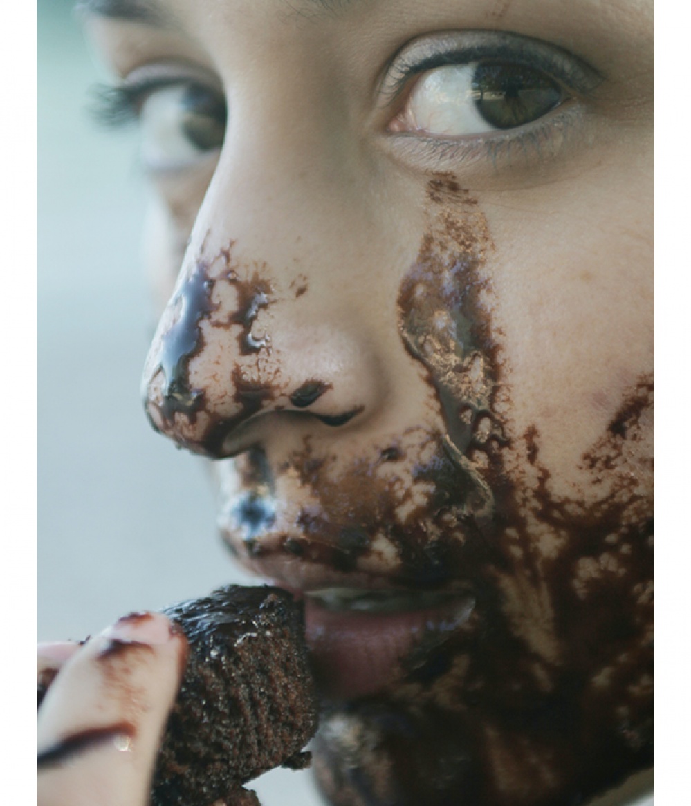 woman with chocolate around her mouth