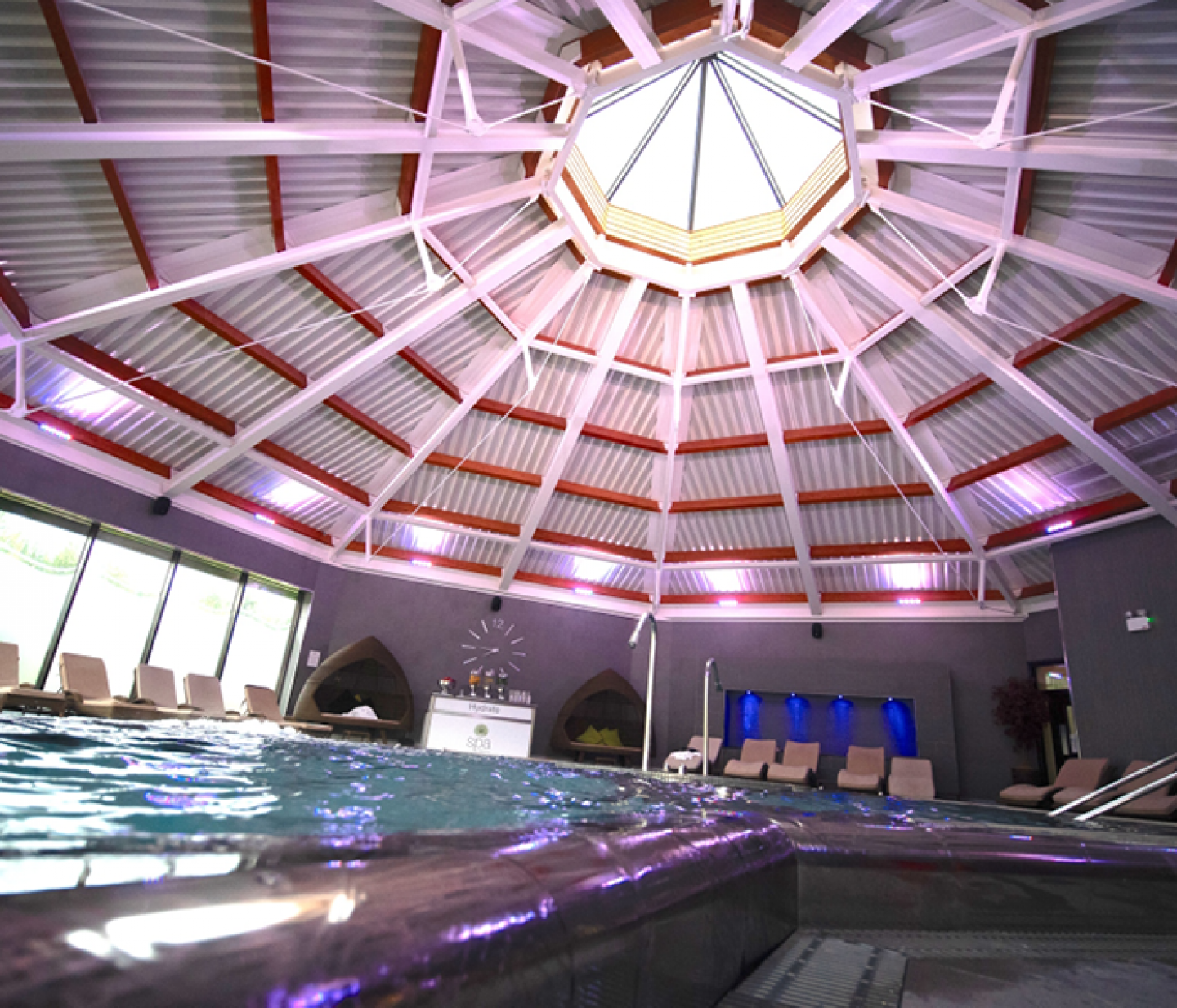 Inside a spa pool looking up to a skylight