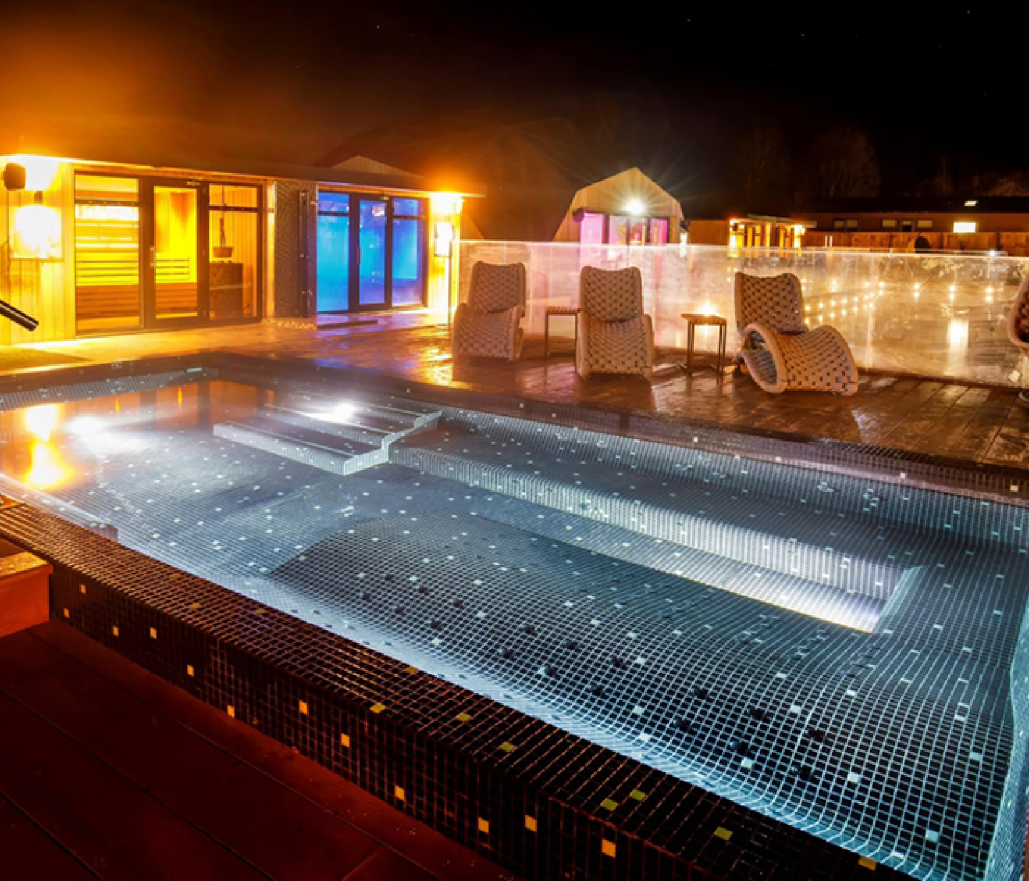 outdoor spa area in the dark