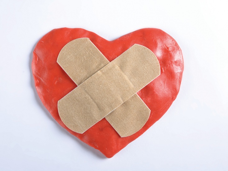 heart with a plaster on it