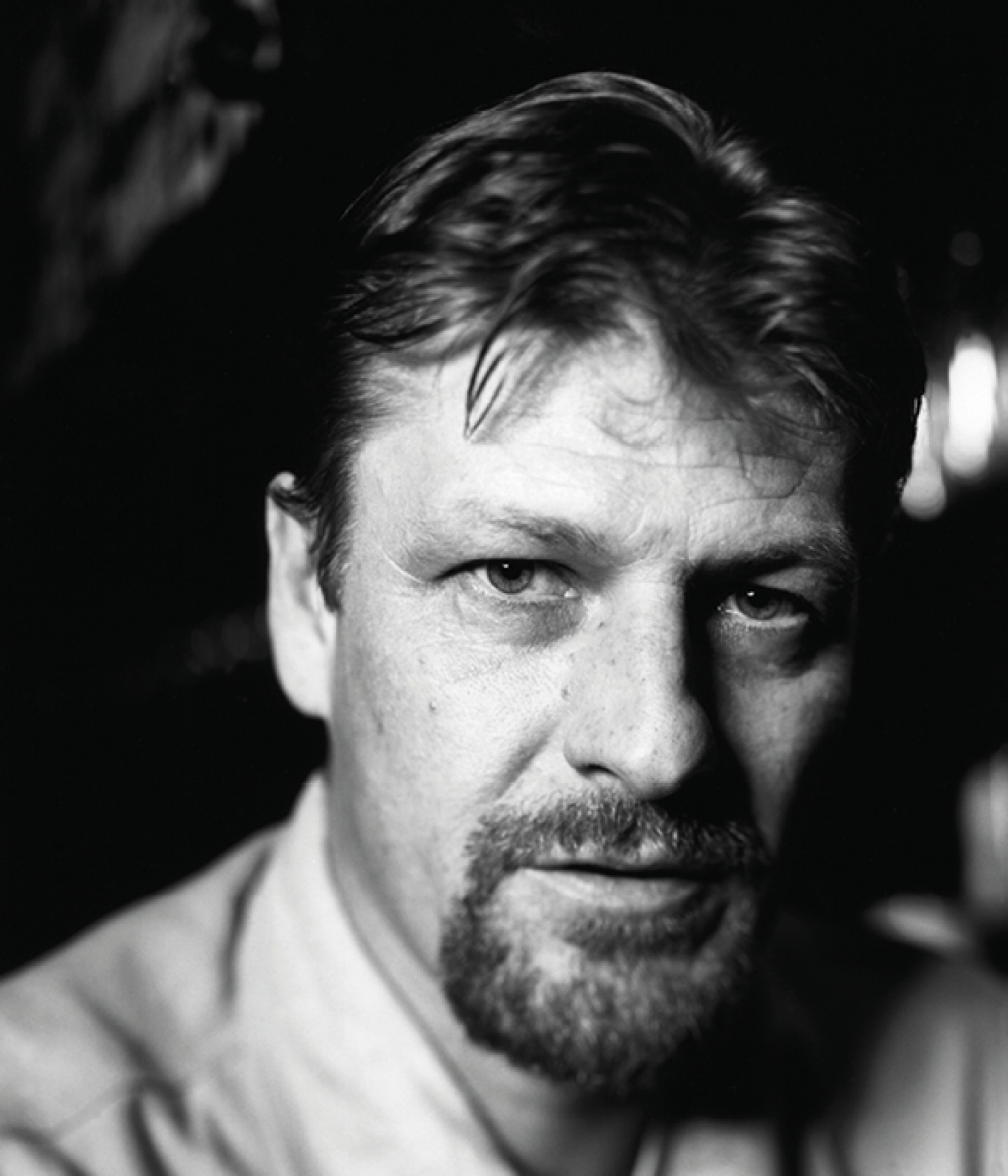 Black and white portrait of Sean Bean