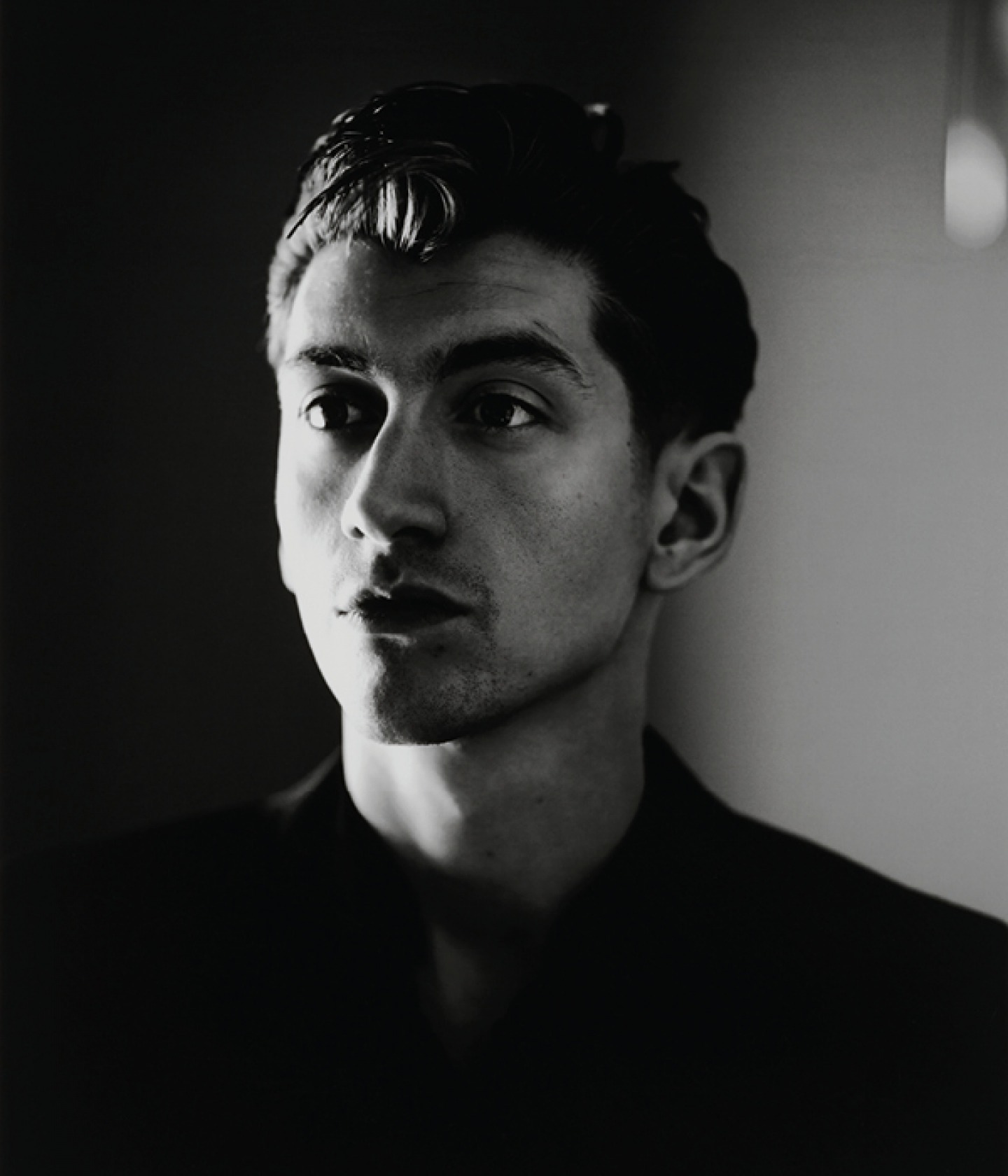 Black and white portrait of Alex Turner