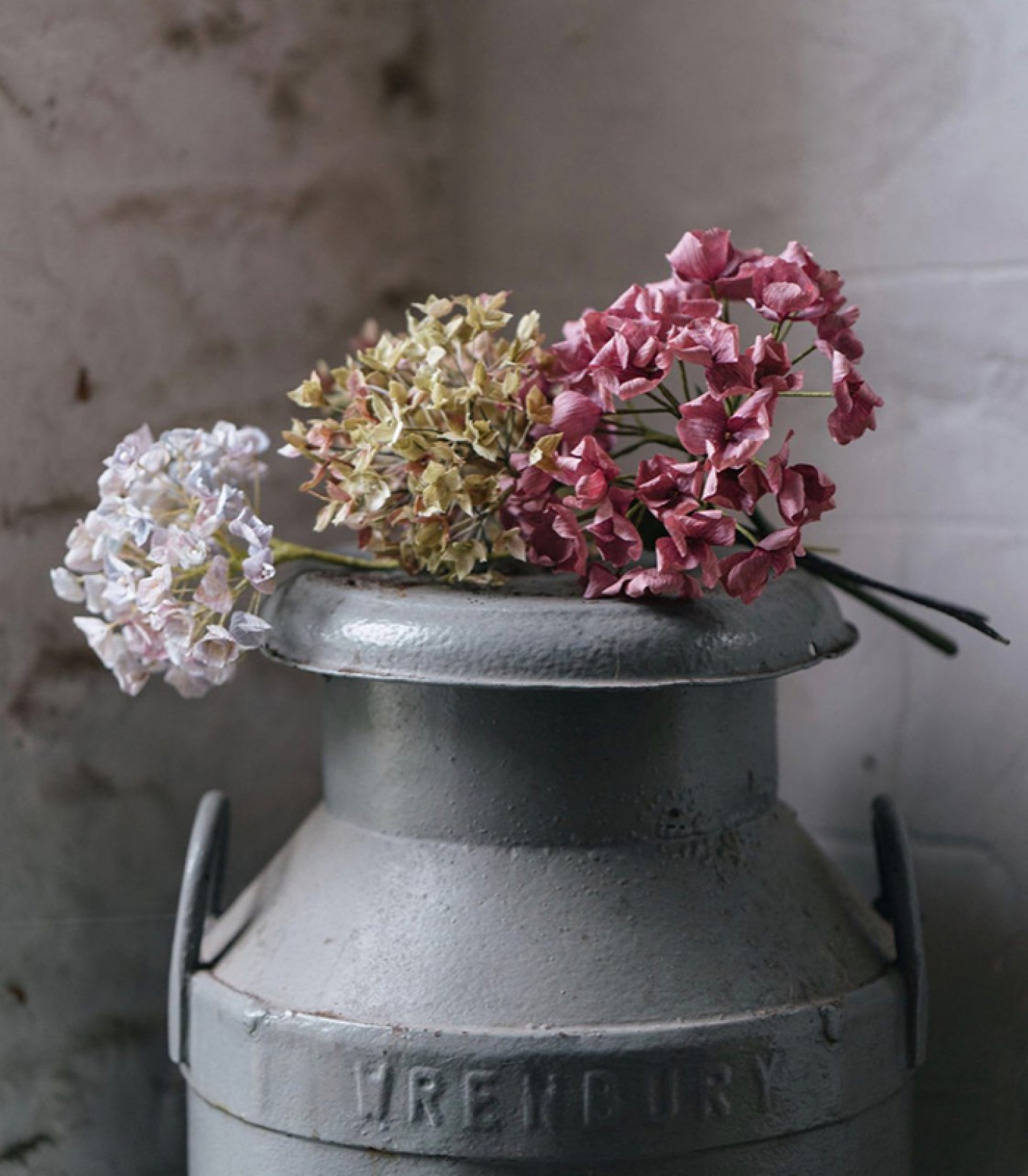 Milk Chern with paper hydrangeas on top