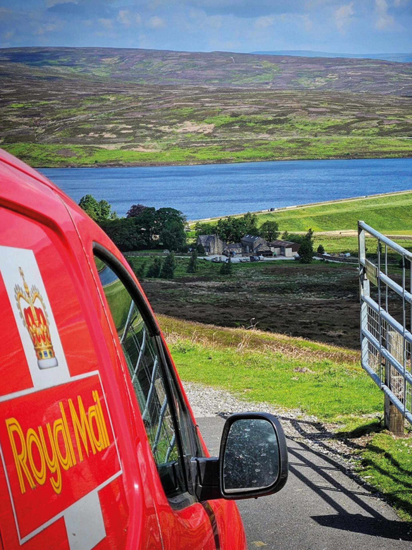 Royal Mail van with Lower Barden Reservoir in foreground