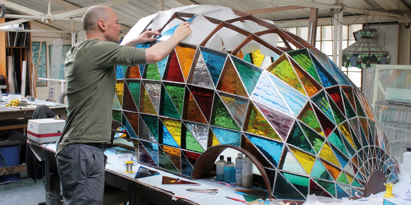 Dominic Wilcox working on a coloured glass structure