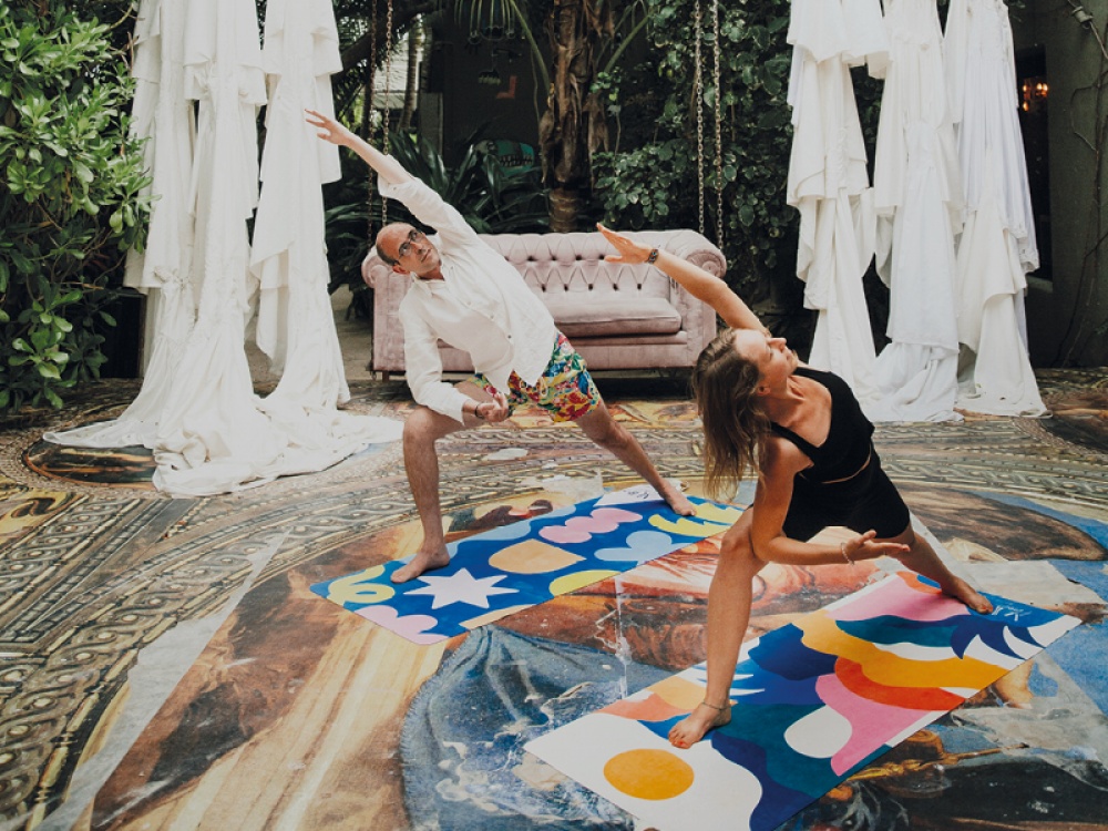 2 people doing yoga