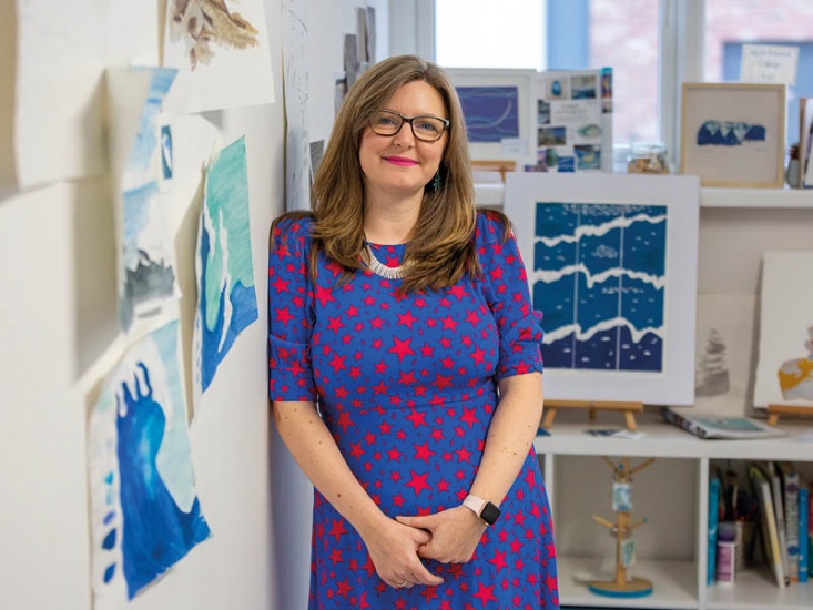 artists smiling at camera