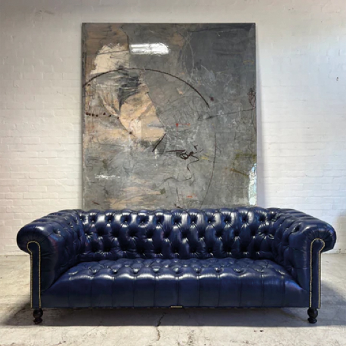 Blue leather Chesterfield sofa
