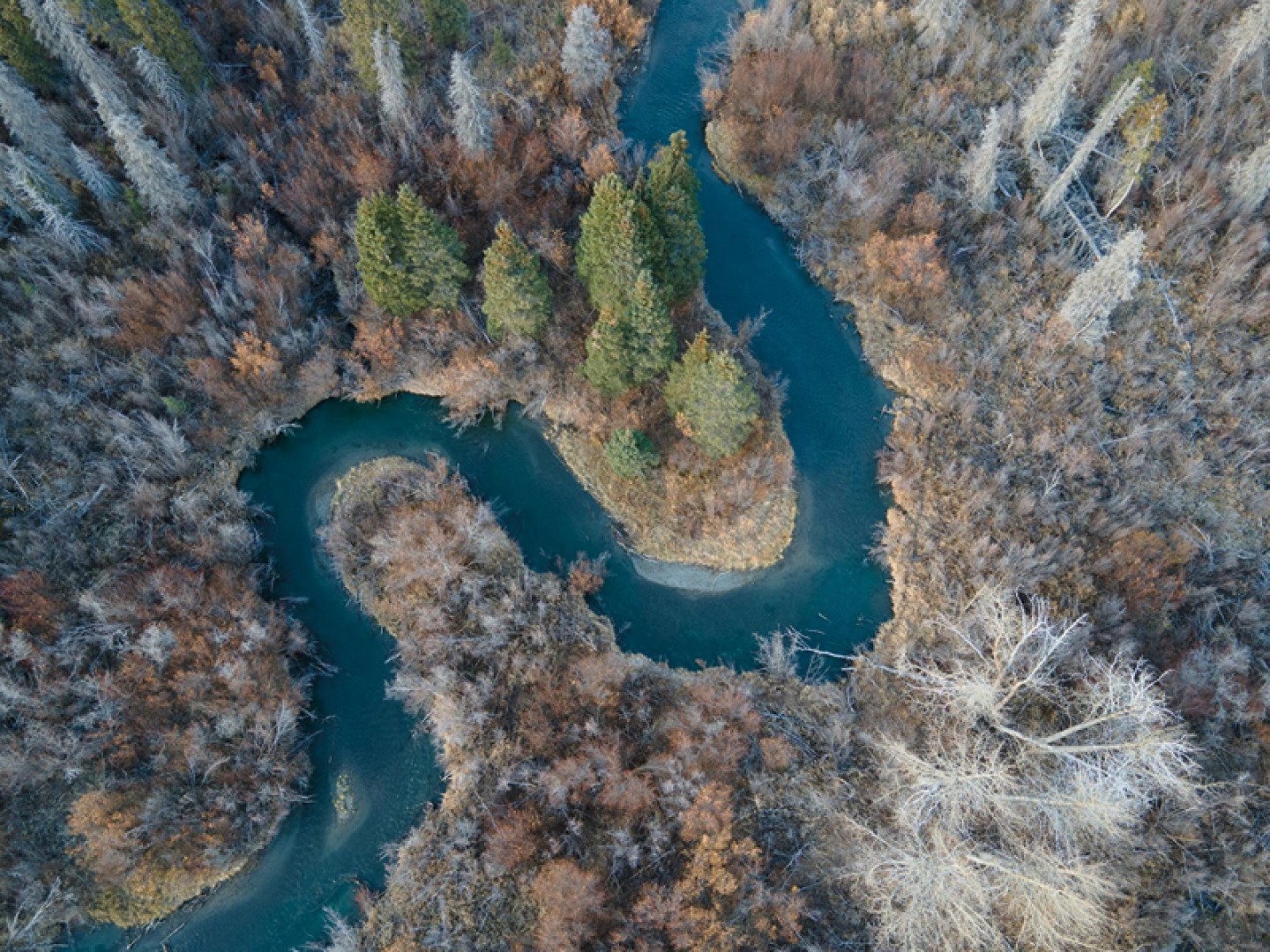 Ariel view of meandering river through The Yukon District, Canada