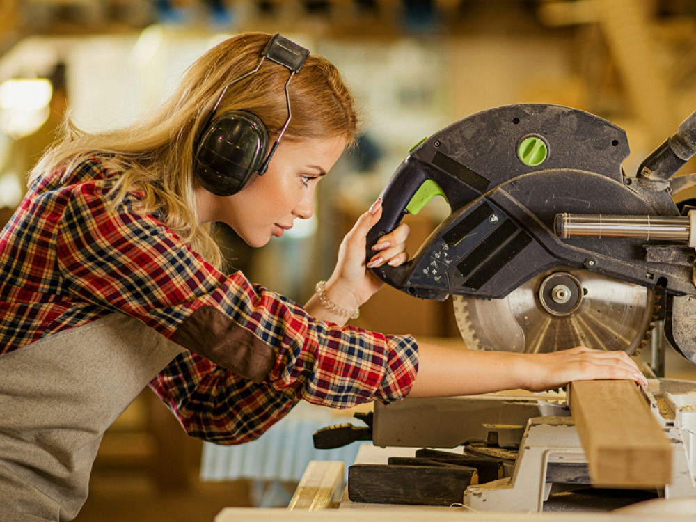 woman using a saw