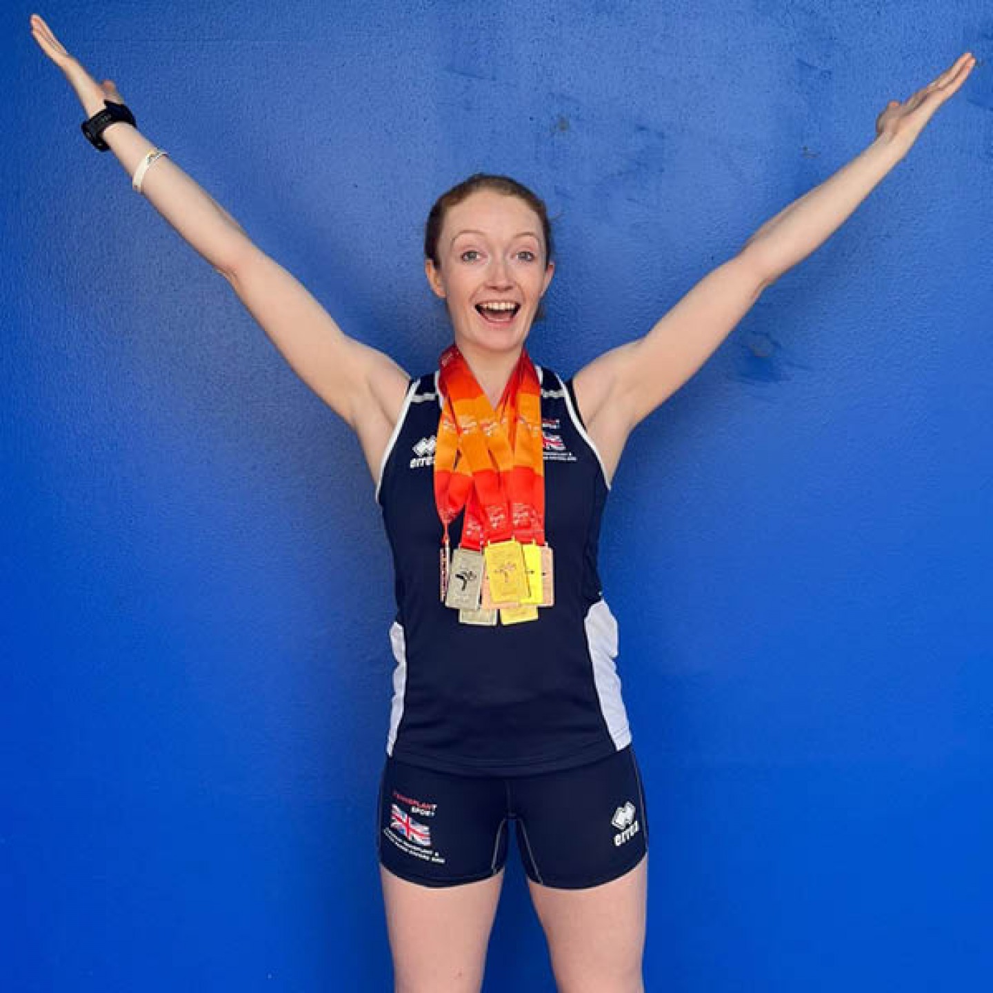 Charlotte sporting all her medals
