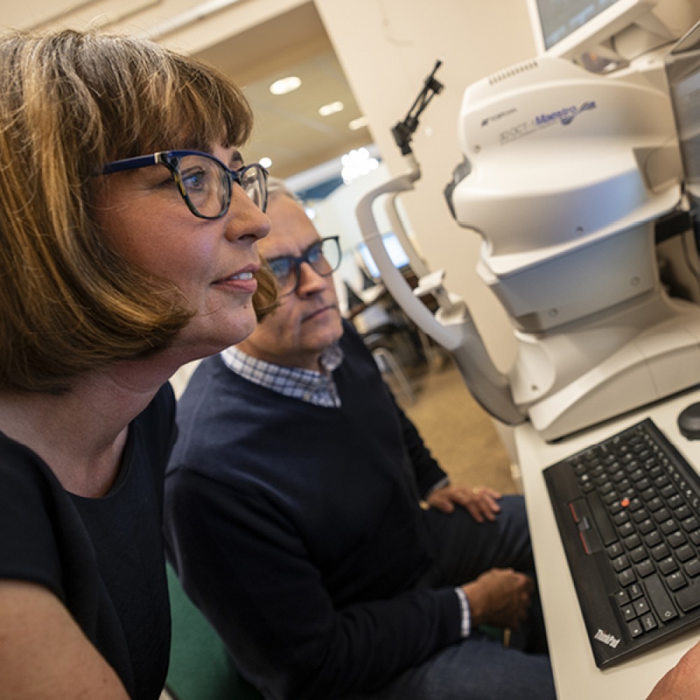 optician looking at a screen