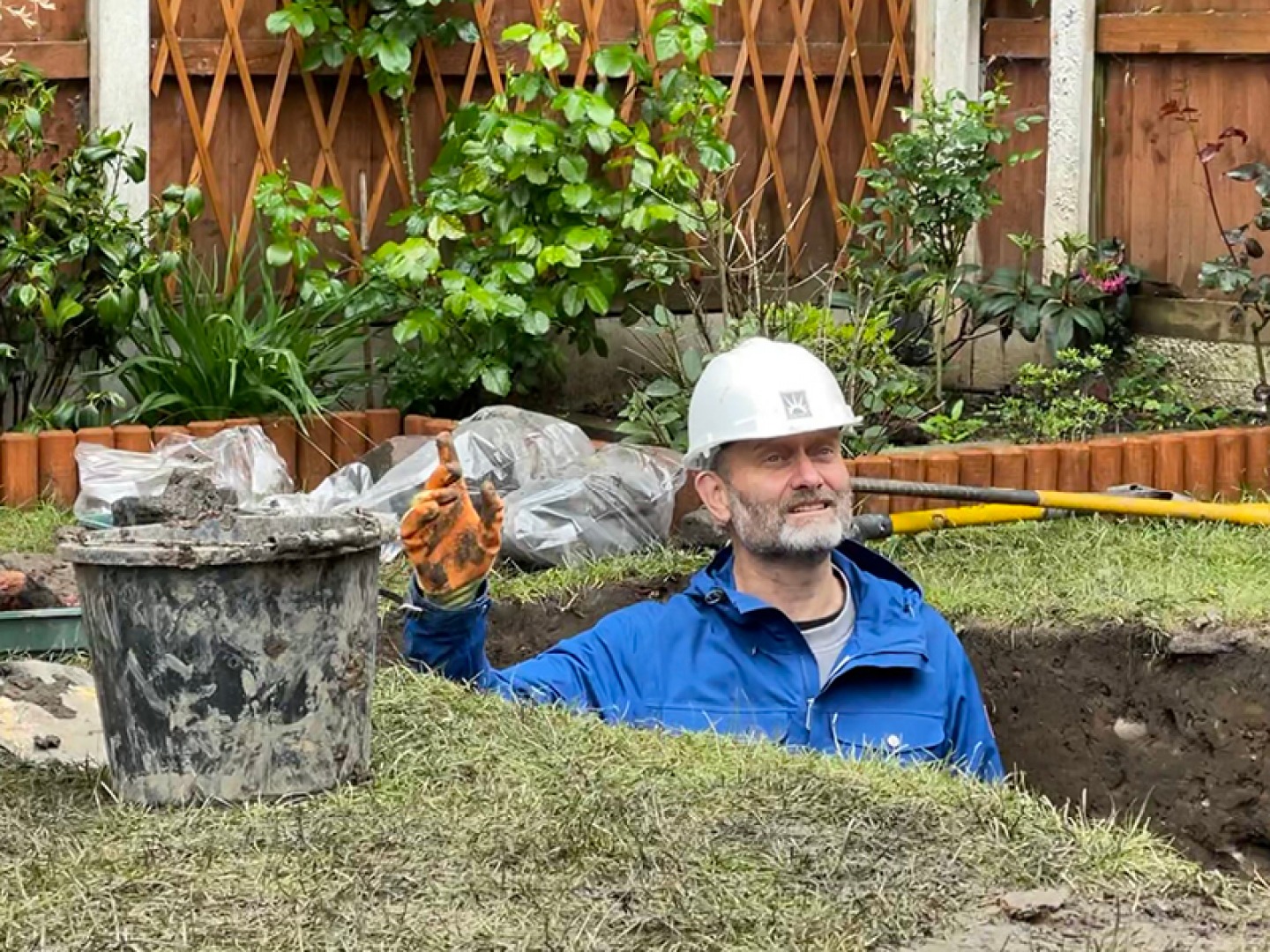 Hugh Dennis in a excavation trench