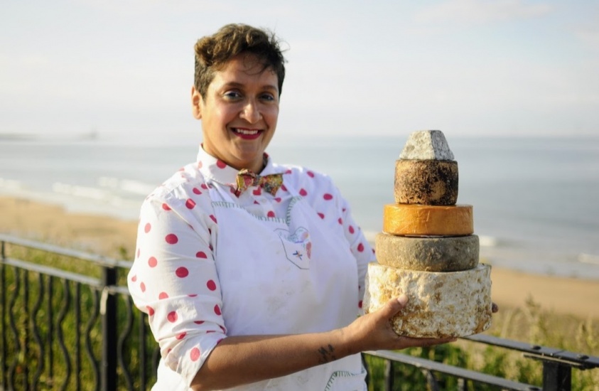 Hannah Bramble holding cheese cake