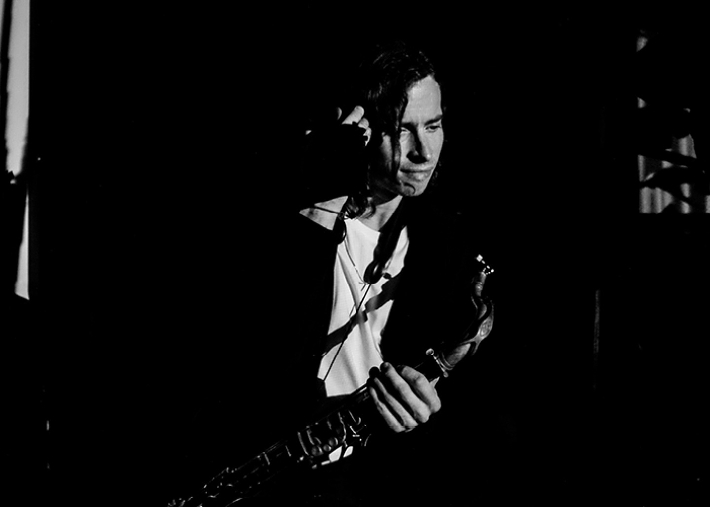 black and white photo of John playing Sax