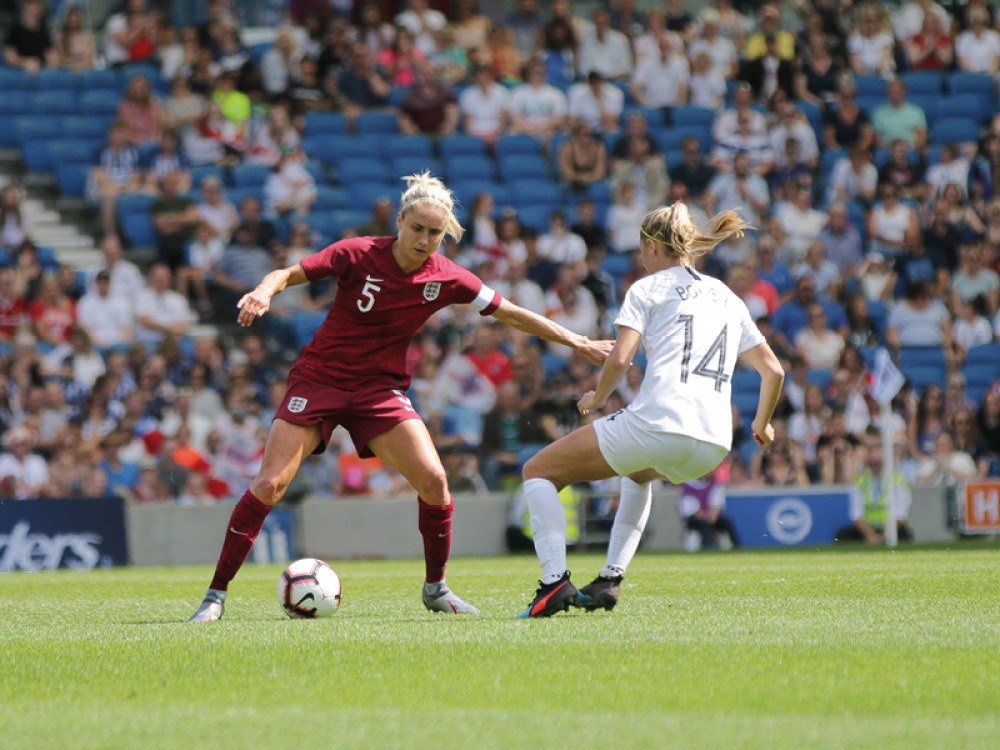 Steph Houghton playing football 