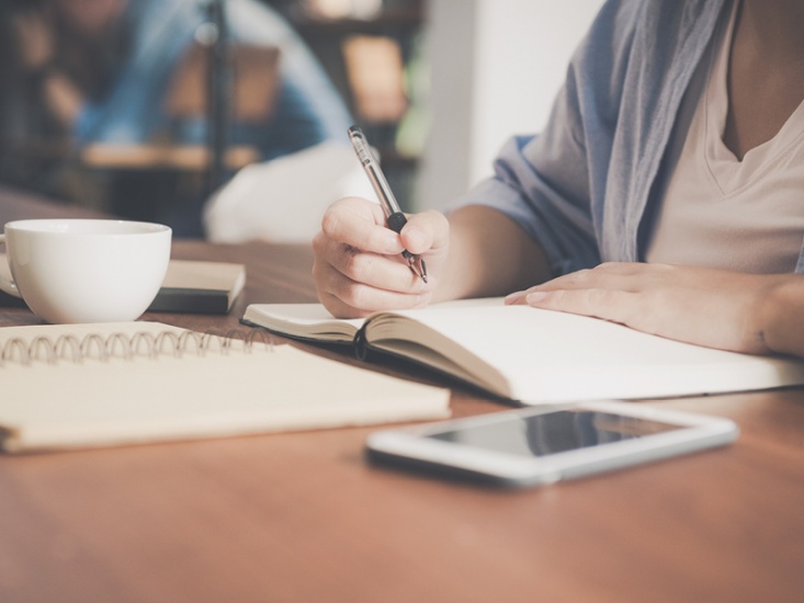 hand writing in a notebook