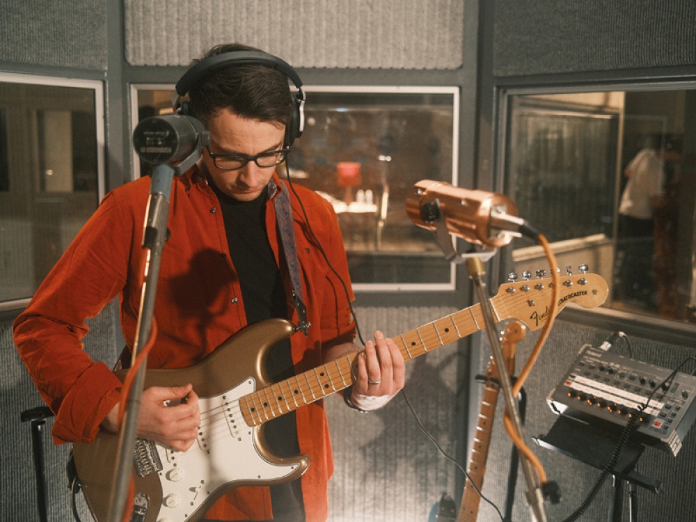 RJ Thompson in a recording booth at Abbey Road