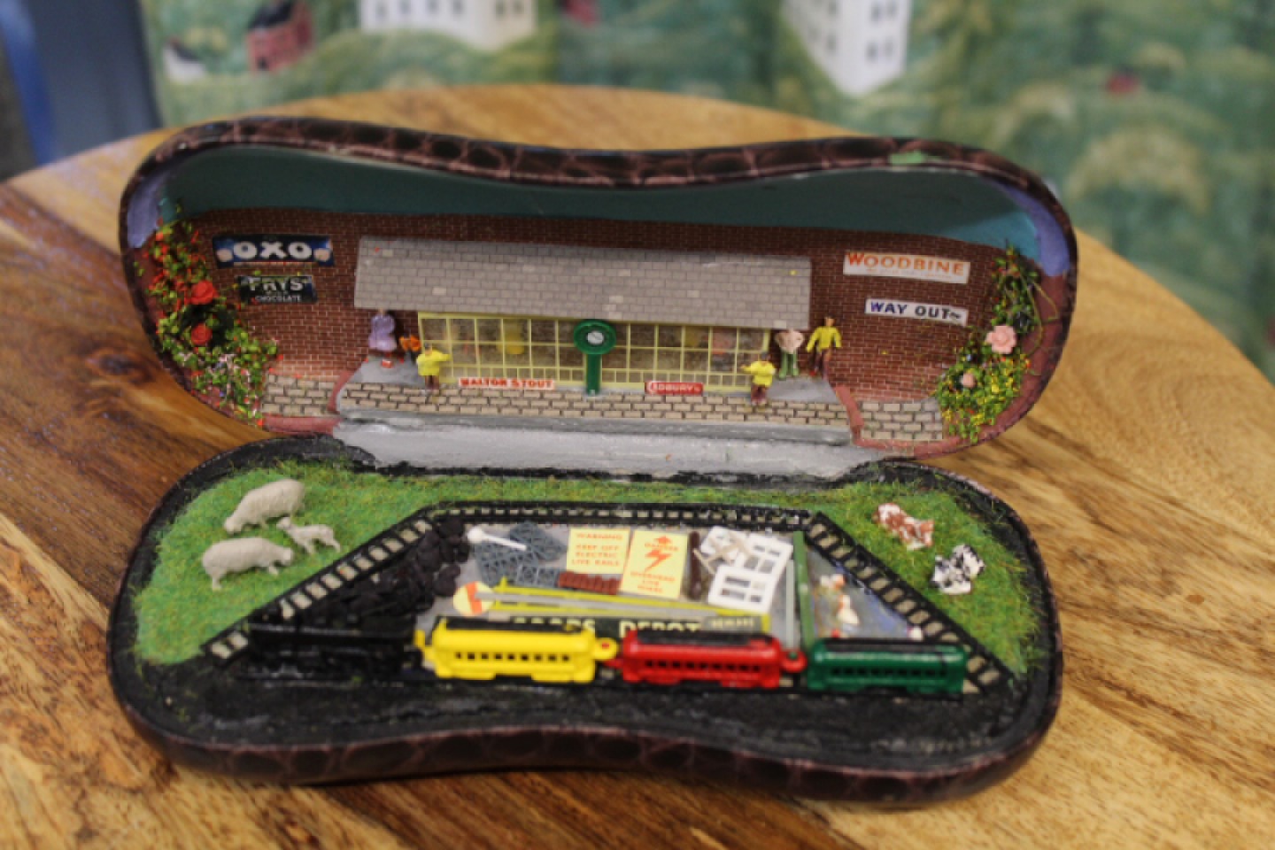 Miniature railway crafted in a glasses case