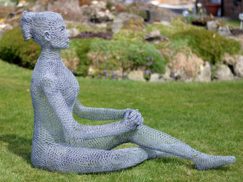 wire sculpture of a woman