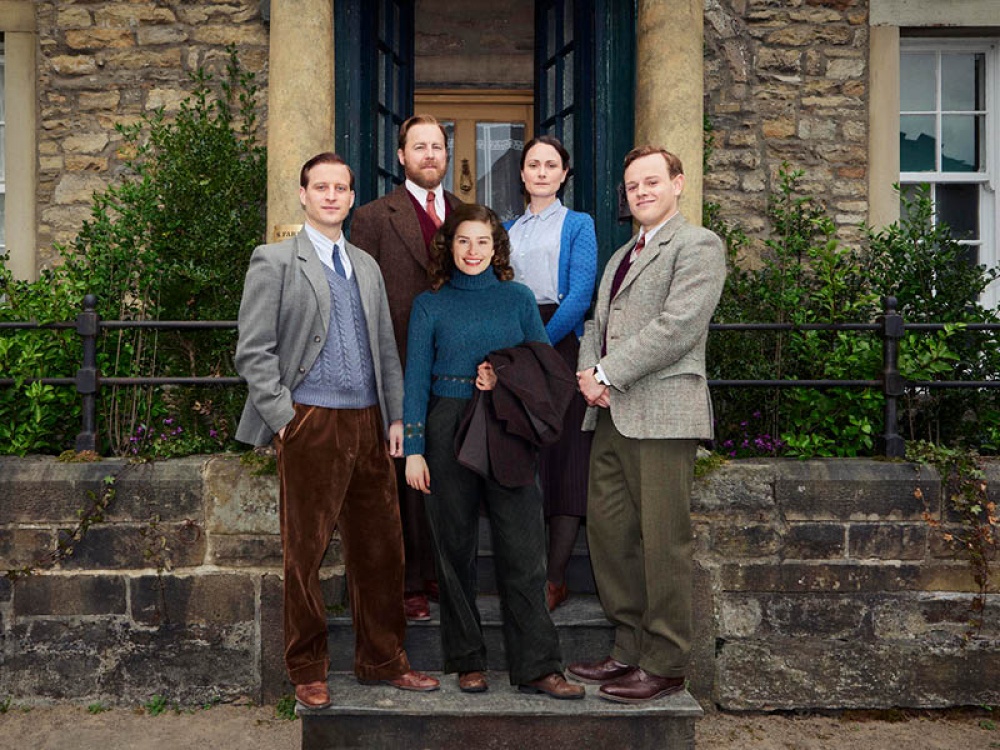 family stood on a step