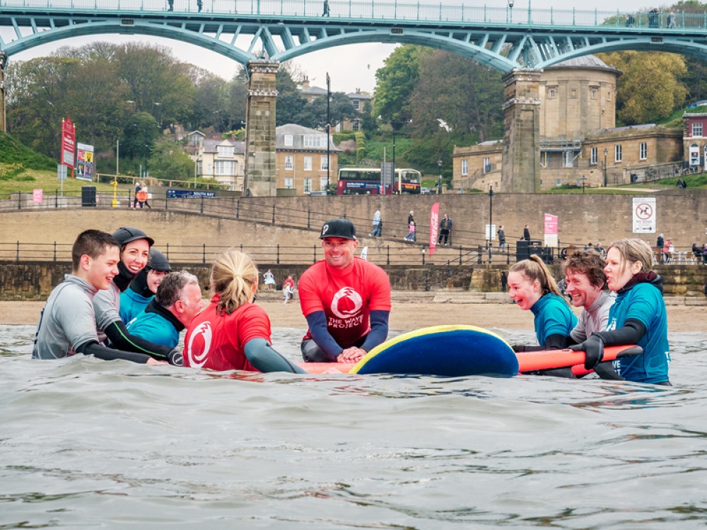 surfs in the water