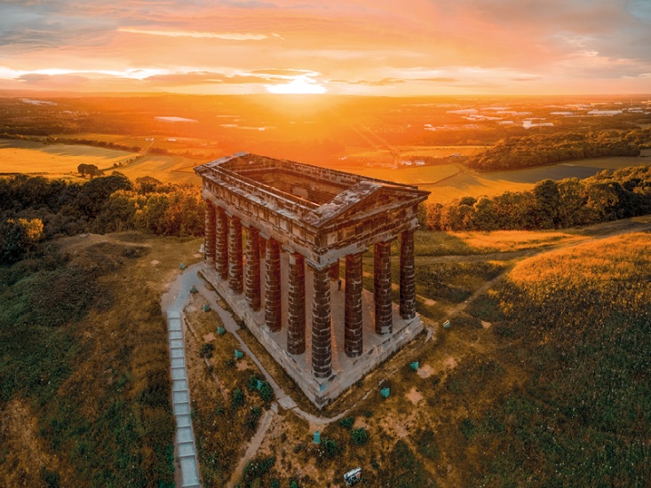 sunrise over a monument