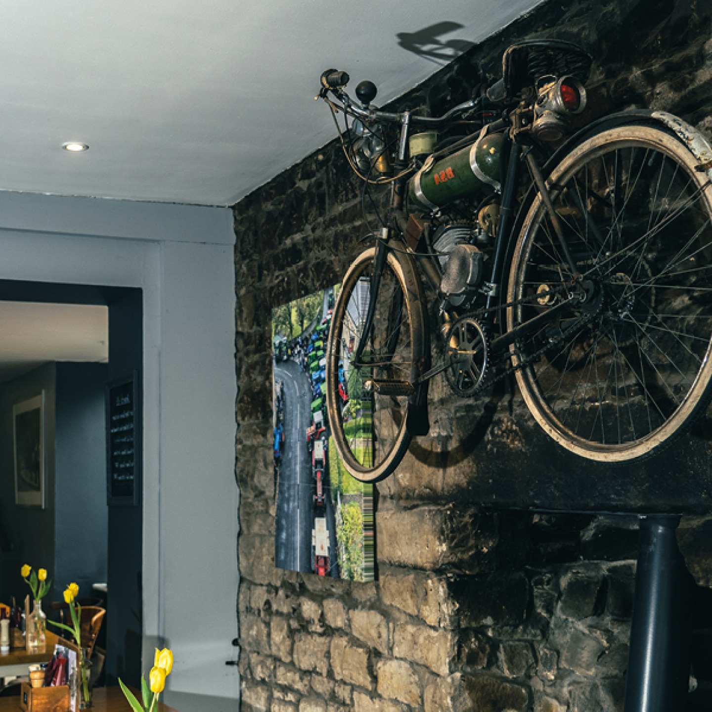 Interior of Crown Inn with a Bicycle hanging on the wall