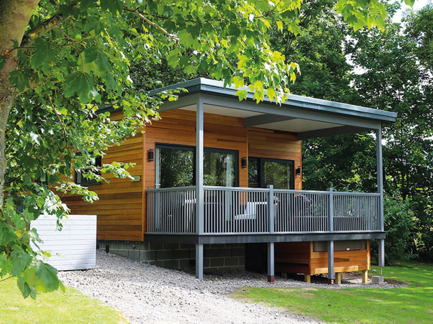 wooden cabin with raised deck