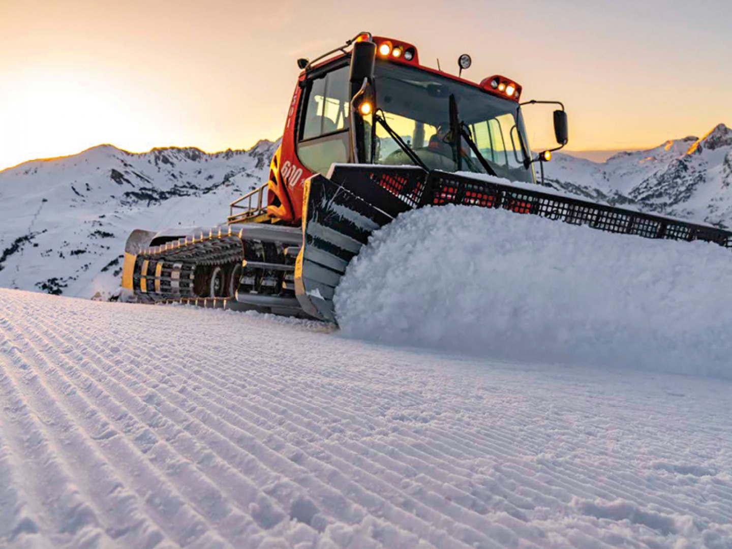 piste groomer, flattening and compacting the snow