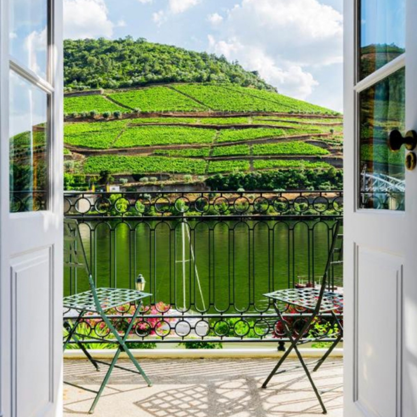 View from a balcony over the river to the vineyards