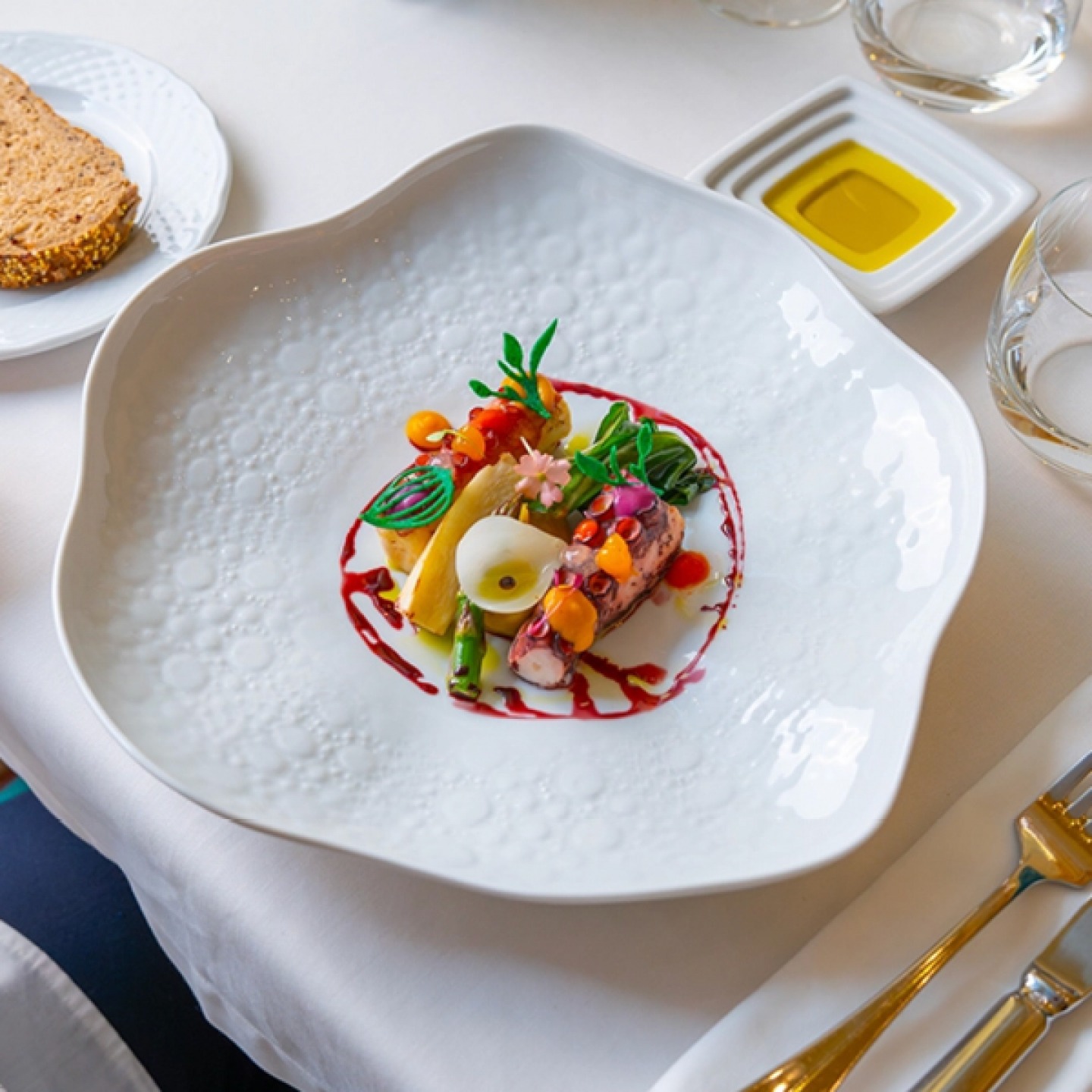 colourful a la carte food on a wave edged plate