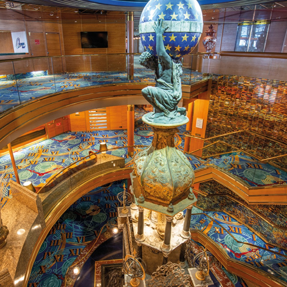 Circular stair case with a feature statue in the centre