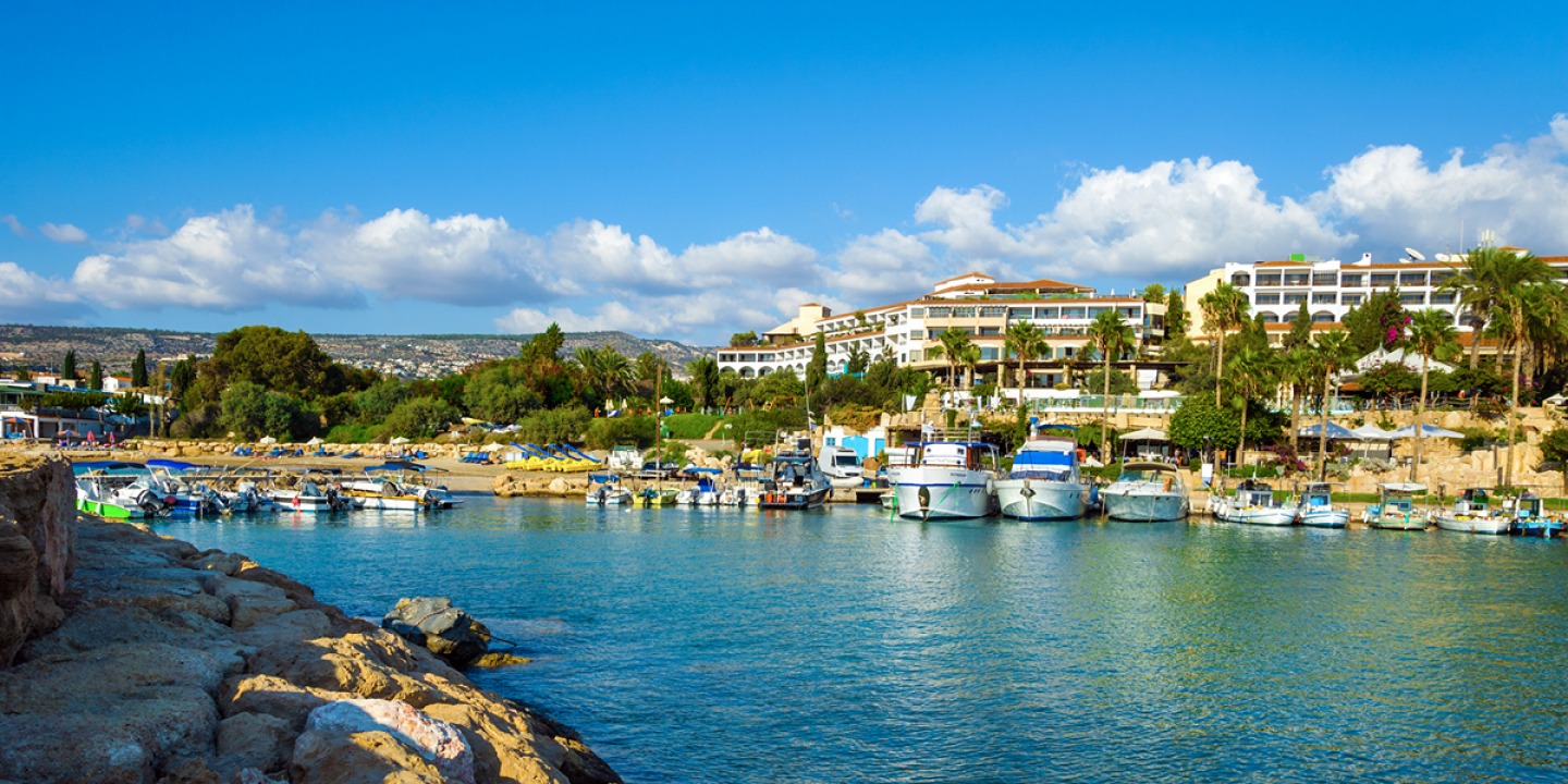 Coral Bay, harbour with boats and hotels in background