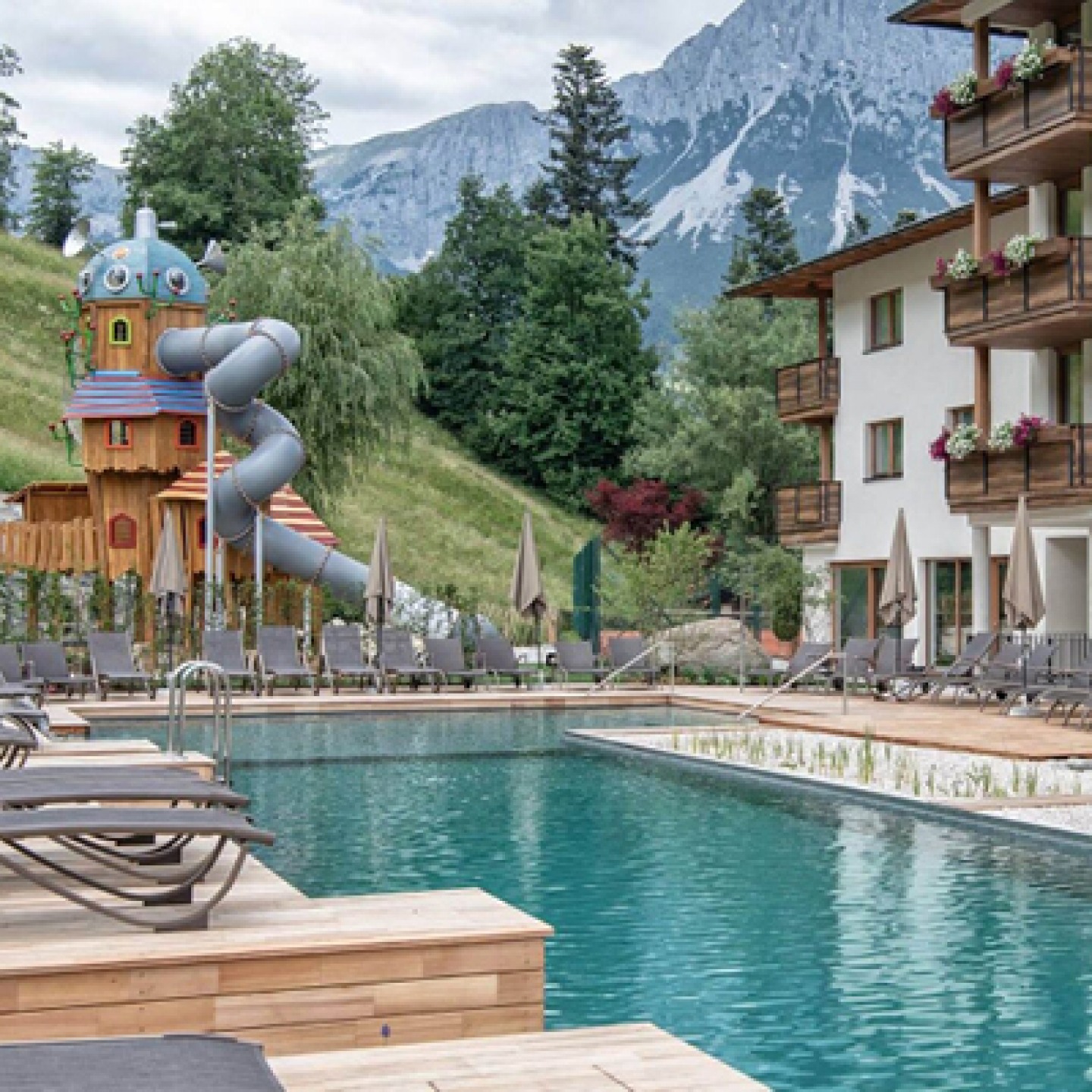 Hotel pool with water slide at Hotel Christoph
