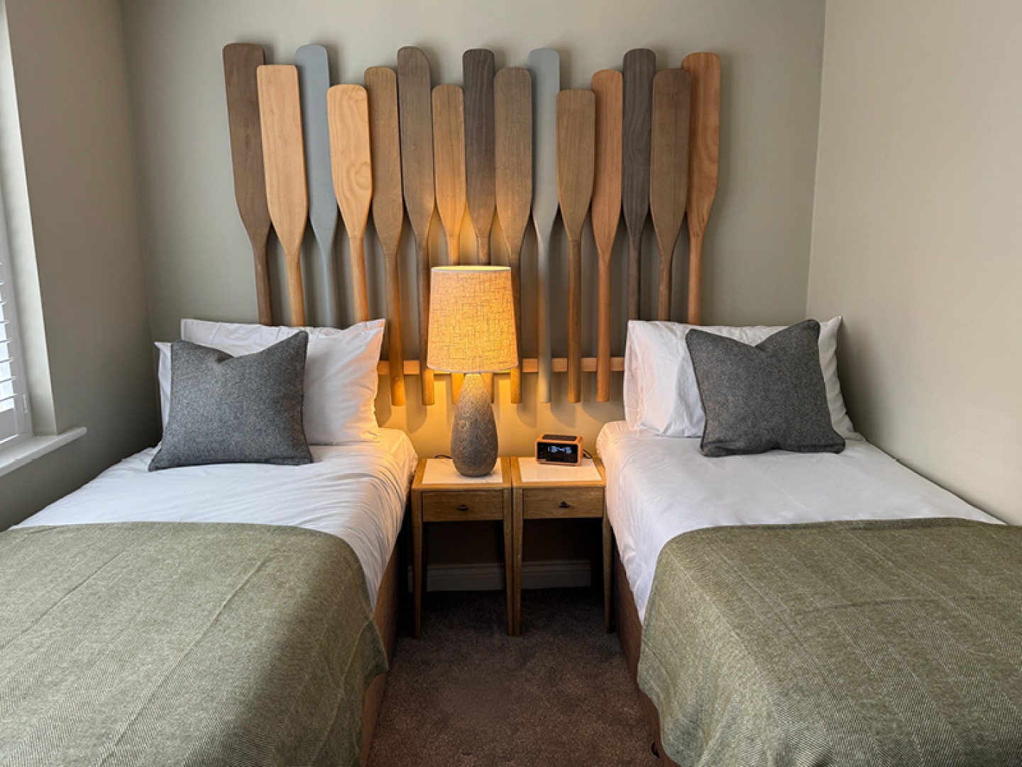 Twin room with statement headboard of oars