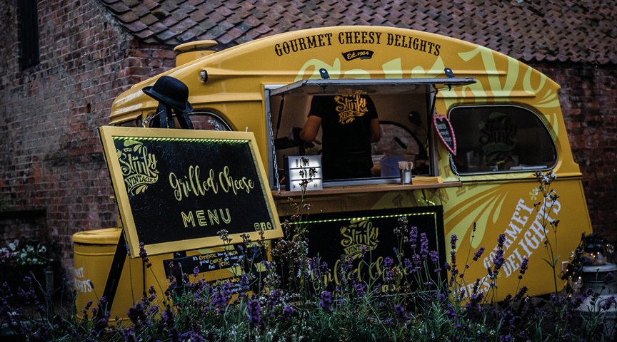 yellow cheesy food van