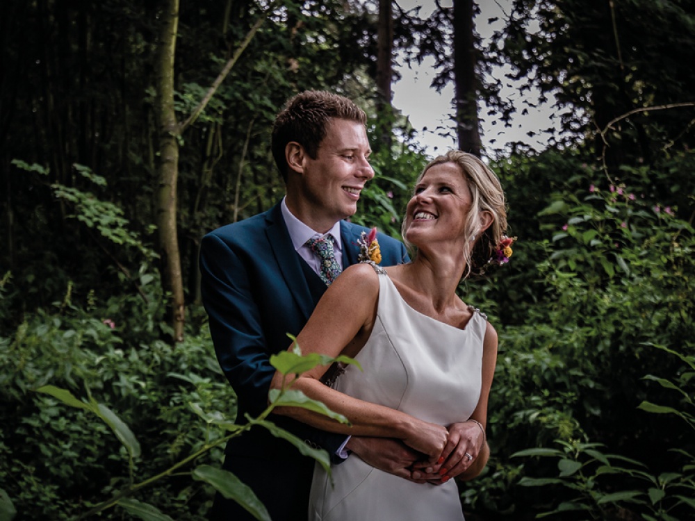 Bride and groom posing together